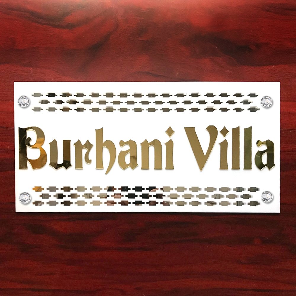 Close-up of 1.5mm golden mirror acrylic letters on a 5mm white acrylic name plate