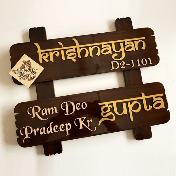 Close-up of raised 3mm letters on brown teak wood name plate with glossy polish