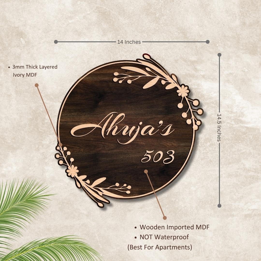 Brown oval wooden nameplate mounted on a house entrance door, 14.5 x 14 inch