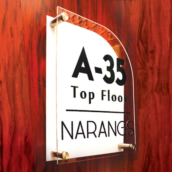 Two layered acrylic name plate for home with clear 6MM front over white base and black lettering