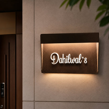 LED metal name plate glowing at night, illuminated name plate for home