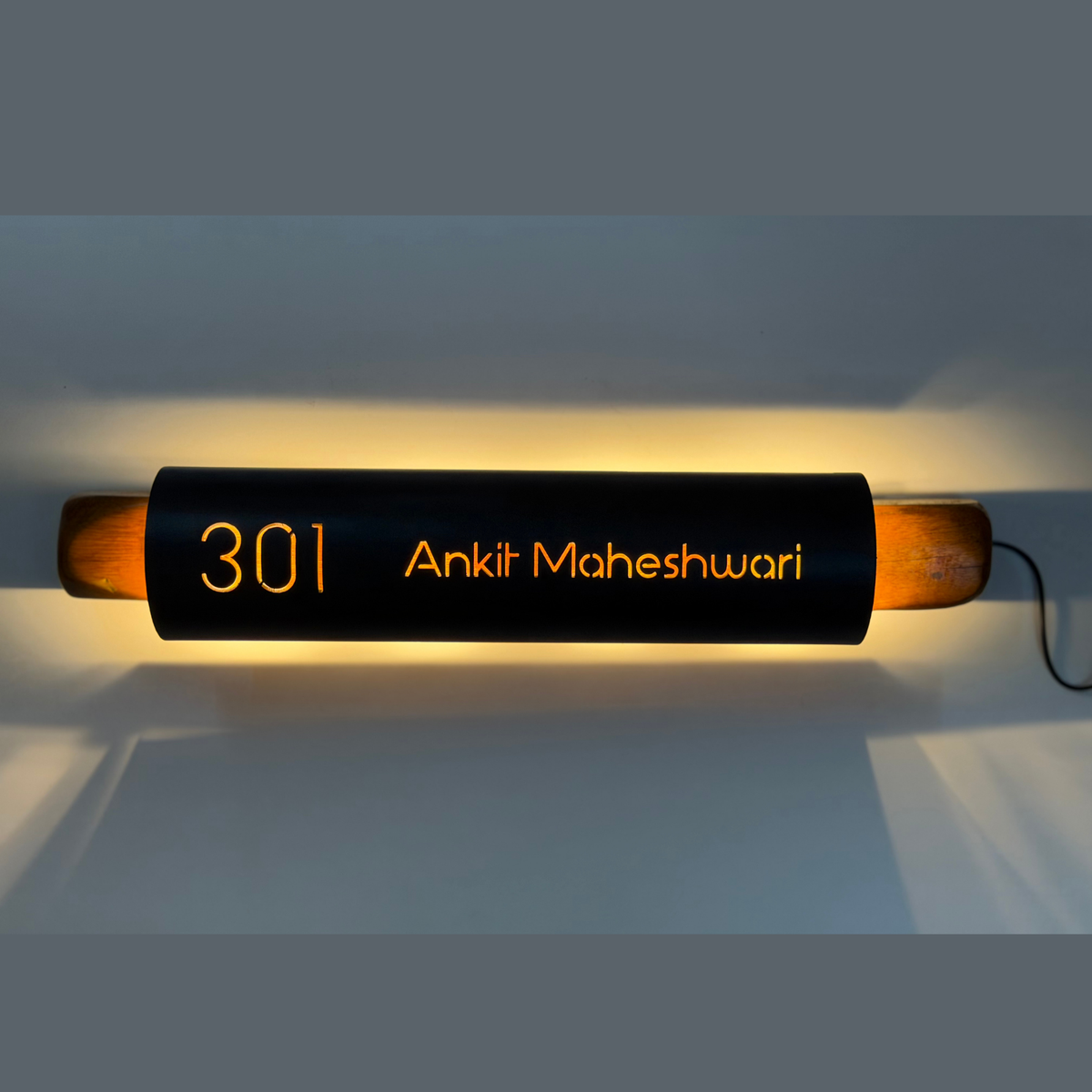 Modern cylindrical LED house nameplate with mild steel body and wood ends